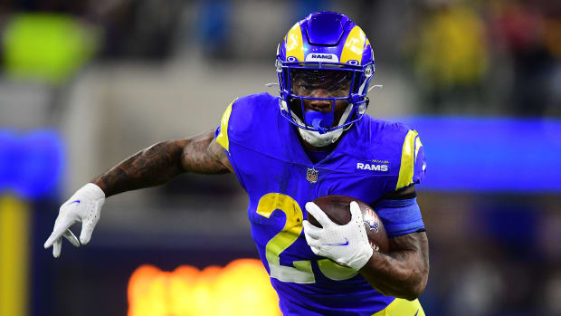 Jan 17, 2022; Inglewood, California, USA; Los Angeles Rams running back Cam Akers (23) runs the ball against the Arizona Cardinals during the second half in the NFC Wild Card playoff football game at SoFi Stadium. Mandatory Credit: Gary A. Vasquez-USA TODAY Sports